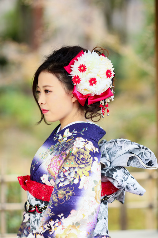 A girl with beautiful hairpiece and kimono for her 20th birthday.