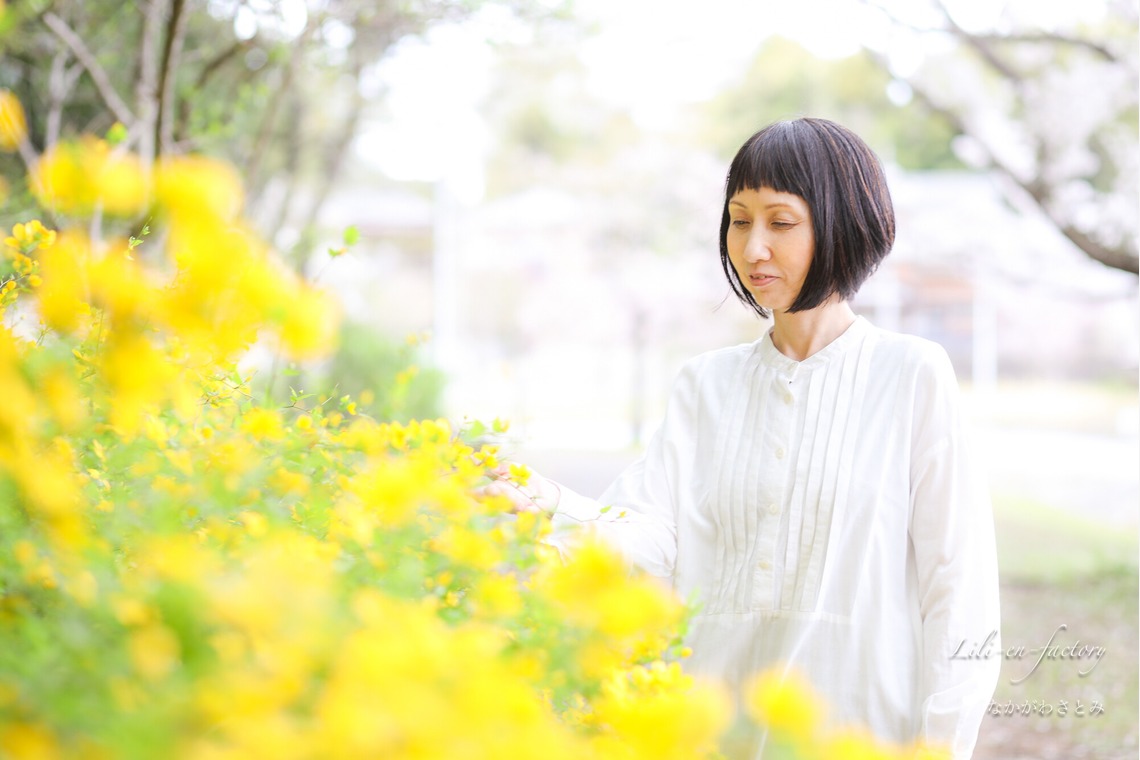 なかがわさとみが撮影した「中学校入学の日に桜と撮影」の写真