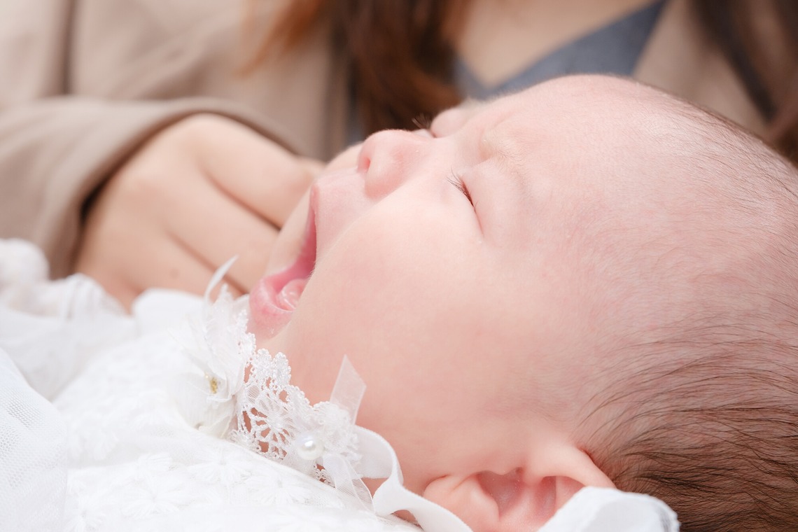 高夏写真店が出張撮影した家族写真(キッズ,ベビーフォト)などが写った「お宮参りの撮影」の家族写真