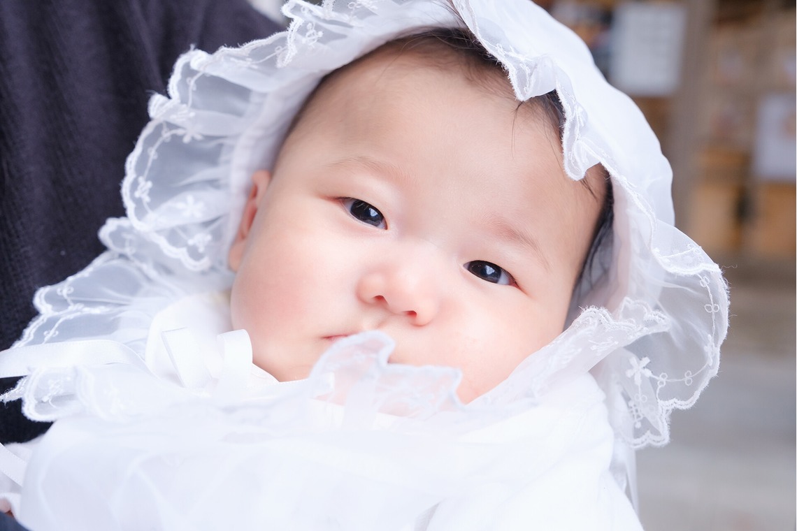 高夏写真店が出張撮影した家族写真(キッズ,ベビーフォト)などが写った「お宮参りの撮影」の家族写真