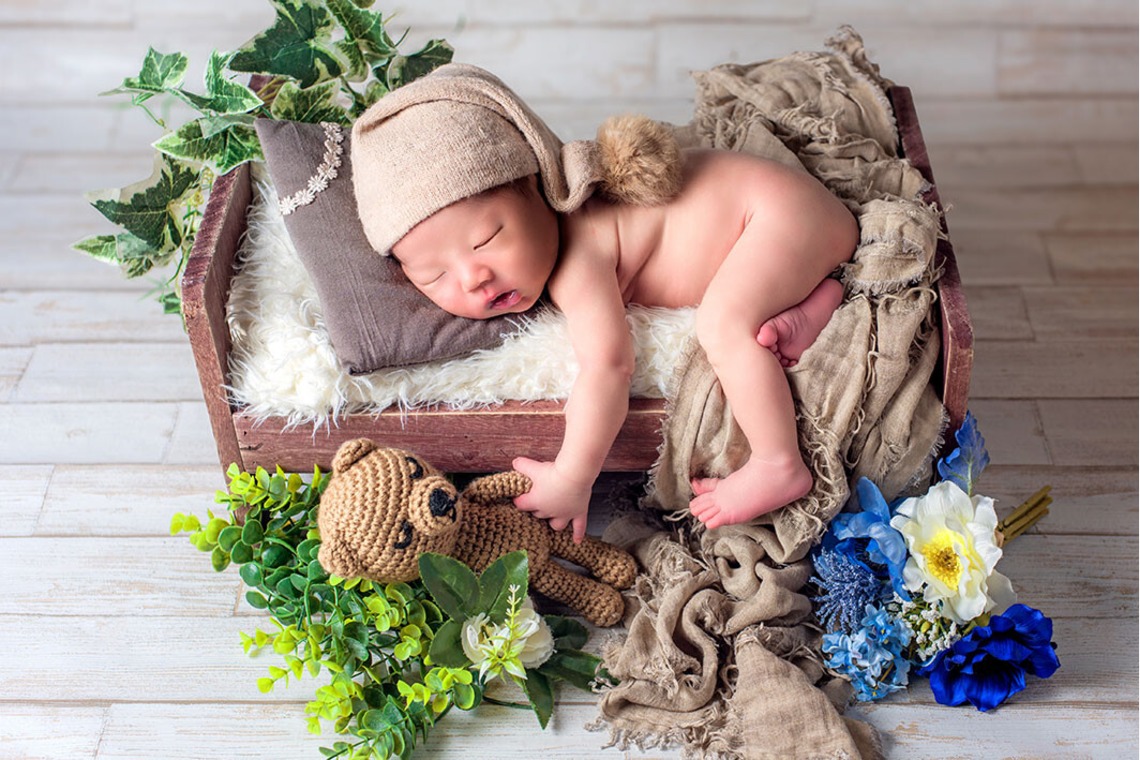 AXiS Photo Servise 藤井靖史が出張撮影した家族写真(キッズ,ベビーフォト)などが写った「ニューボーンフォト」の家族写真