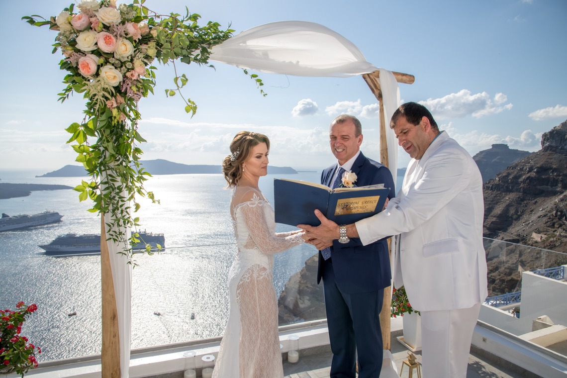 Photo of Santorini Wedding Ceremony taken by Olga Chalkiadaki