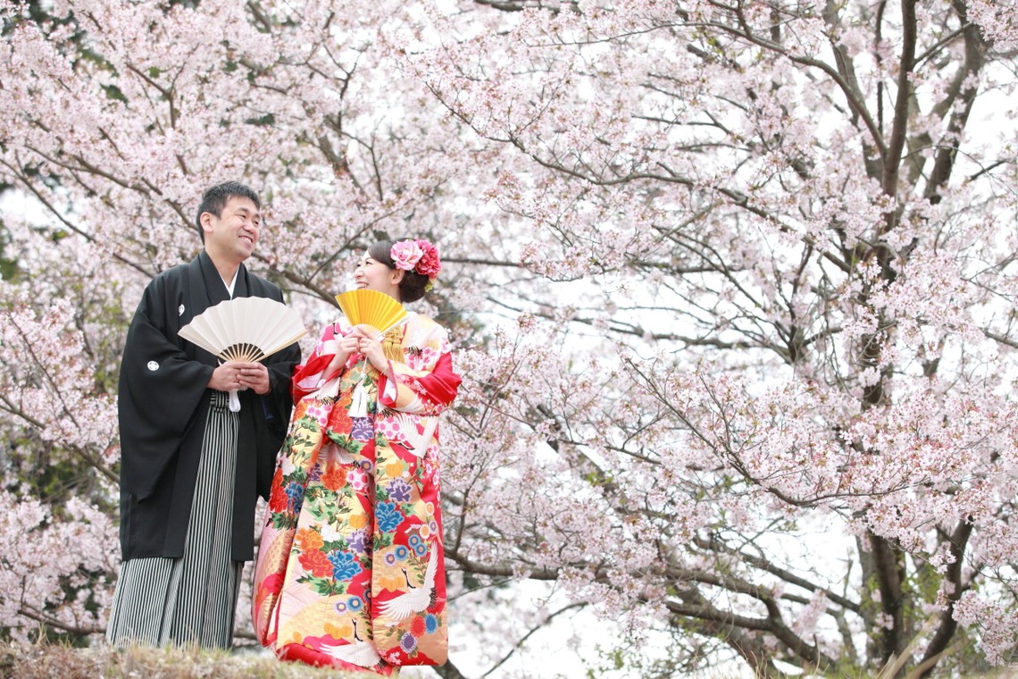 In the sakura — Photo by by Kaoru Photography