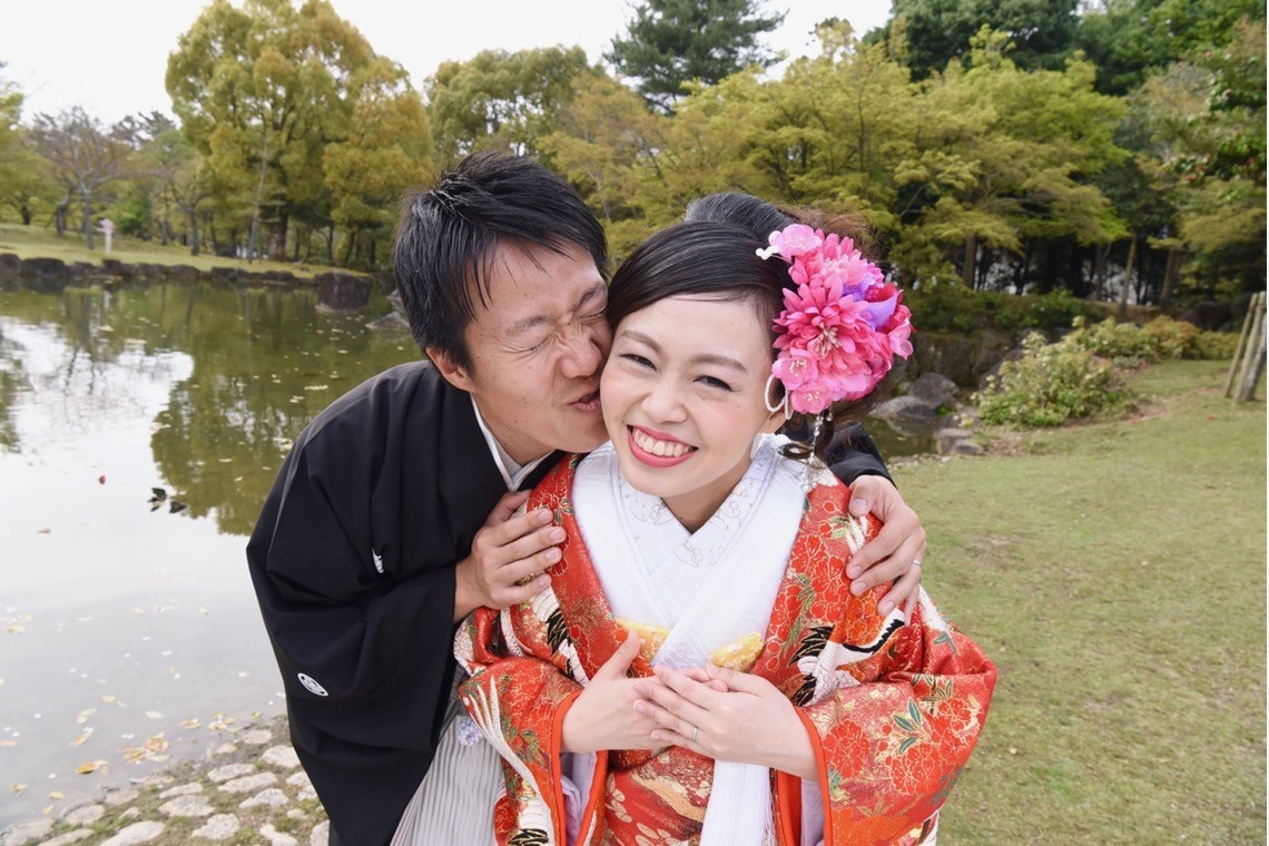 Photo of Pre Weddingphotoshoot in Nara park in the cherry blossom season for foreigners. taken by Kiki photo works