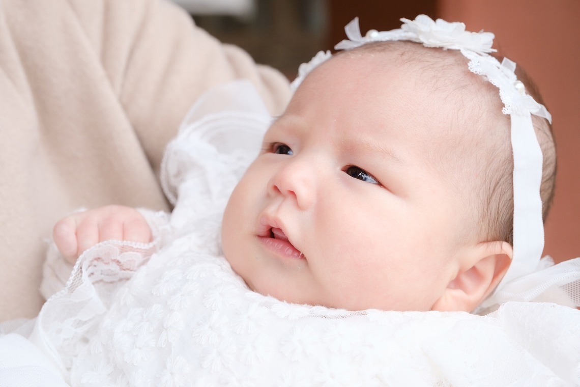 高夏写真店が出張撮影した家族写真(キッズ,ベビーフォト)などが写った「お宮参りの撮影」の家族写真