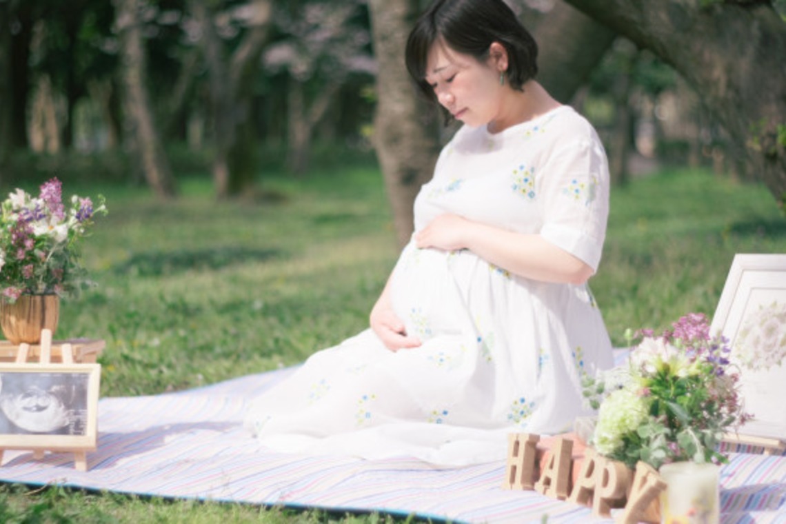 富岡 そよぎが撮影した「桜の季節のマタニティフォト」の写真